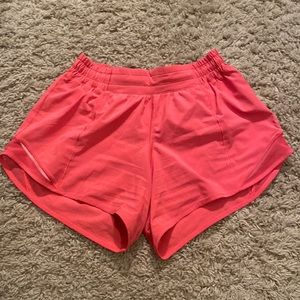 Lululemon hotty hot shorts 4” size 4 in coral color.